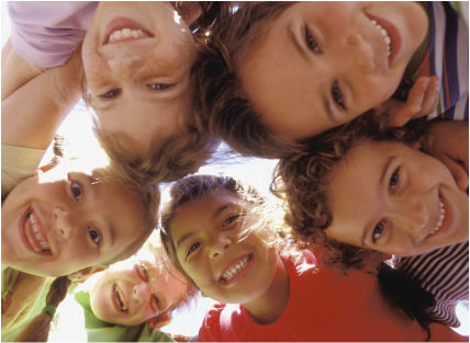 group of kids looking up at a camera